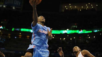 Feb 23, 2014; Oklahoma City, OK, USA; Los Angeles Clippers shooting guard Jamal Crawford (11) attempts a shot against Oklahoma City Thunder small forward Kevin Durant (35) during the second quarter at Chesapeake Energy Arena. Mandatory Credit: Mark D. Smith-USA TODAY Sports