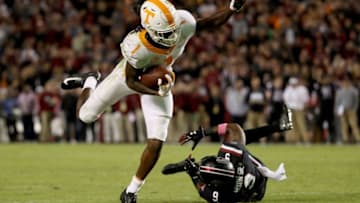 COLUMBIA, SC - OCTOBER 27: Keisean Nixon #9 of the South Carolina Gamecocks tries to tackle Marquez Callaway #1 of the Tennessee Volunteers during their game at Williams-Brice Stadium on October 27, 2018 in Columbia, South Carolina. (Photo by Streeter Lecka/Getty Images)