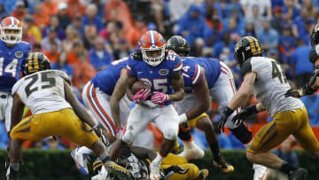 Oct 15, 2016; Gainesville, FL, USA; Florida Gators running back Jordan Scarlett (25) carries the ball against the Missouri Tigers during the second half at Ben Hill Griffin Stadium. The Gators won 40-14. Mandatory Credit: Kim Klement-USA TODAY Sports