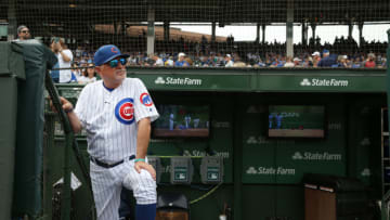 Chicago Cubs manager Joe Maddon watches a video tribute to WGN Broadcasting before a game against the St. Louis Cardinals at Wrigley Field in Chicago on Saturday, Sept. 21, 2019. (John J. Kim/Chicago Tribune/Tribune News Service via Getty Images)