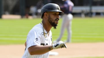 CHICAGO - SEPTEMBER 17: Jose Abreu #79 of the Chicago White Sox celebrates with his "u201cpinky high five"u201d after hitting his 17th home run of the season in the fourth inning against the Minnesota Twins on September 17, 2020 at Guaranteed Rate Field in Chicago, Illinois. (Photo by Ron Vesely/Getty Images)