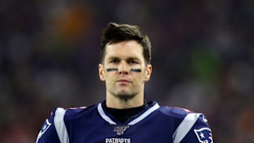 FOXBOROUGH, MASSACHUSETTS - JANUARY 04: Tom Brady #12 of the New England Patriots looks on from the sideline during the AFC Wild Card Playoff game against the Tennessee Titans at Gillette Stadium on January 04, 2020 in Foxborough, Massachusetts. (Photo by Maddie Meyer/Getty Images)