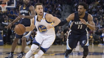 January 6, 2017; Oakland, CA, USA; Golden State Warriors guard Stephen Curry (30) dribbles the basketball against Memphis Grizzlies guard Mike Conley (11) during the third quarter at Oracle Arena. The Grizzlies defeated the Warriors 128-119. Mandatory Credit: Kyle Terada-USA TODAY Sports
