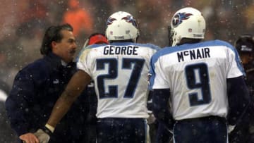 17 Dec 2000: Head coach Jeff Fisher of the Tennessee Titans congratulates Quarterback Steve McNair #9 and Eddie George #27 after a touchdown during Sunday's game against the Cleveland Browns at Cleveland Browns Stadium in Cleveland, Ohio. Digital Image. Mandatory Credit: Jamie Squire/ALLSPORT