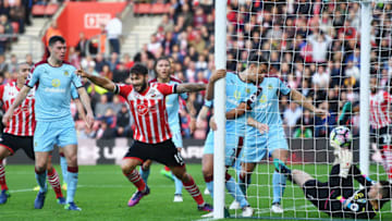 Charlie Austin celebrates the first of his two goals against Burnley at the weekend (Getty Images)