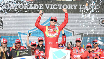 AVONDALE, AZ - MARCH 10: Kyle Busch, driver of the #18 Skittles Toyota, celebrates in Victory Lane after winning the Monster Energy NASCAR Cup Series TicketGuardian 500 at ISM Raceway on March 10, 2019 in Avondale, Arizona. (Photo by Stacy Revere/Getty Images)