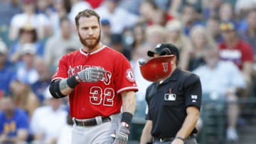 Aug 15, 2014; Arlington, TX, USA; Los Angeles Angels left fielder Josh Hamilton (32) reacts after striking out during the first inning against the Texas Rangers at Globe Life Park in Arlington. Mandatory Credit: Kevin Jairaj-USA TODAY Sports