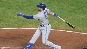 BALTIMORE, MD - SEPTEMBER 19: Justin Smoak #14 of the Toronto Blue Jays takes a swing during a baseball game against the Baltimore Orioles at Oriole Park at Camden Yards on September 19, 2019 in Baltimore, Maryland. (Photo by Mitchell Layton/Getty Images)