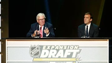LAS VEGAS, NV - JUNE 21: Co-owner Bill Foley, left, and general manager George McPhee of the Vegas Golden Knights make another selection onstage during the 2017 NHL Awards & Expansion Draft at T-Mobile Arena on June 21, 2017 in Las Vegas, Nevada. (Photo by Jeff Vinnick/NHLI via Getty Images)