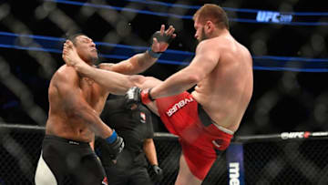 LAS VEGAS, NV - MARCH 04: (R-L) Marcin Tybura of Poland kicks Luis Henrique of Brazil in their heavyweight bout during the UFC 209 event at T-Mobile Arena on March 4, 2017 in Las Vegas, Nevada. (Photo by Jeff Bottari/Zuffa LLC/Zuffa LLC via Getty Images)
