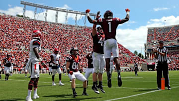 Sep 3, 2016; Blacksburg, VA, USA; Virginia Tech Hokies wide receiver Isaiah Ford (1) celebrates with fullback Sam Rogers (45) after scoring a touchdown against the Liberty Flames during the second quarter at Lane Stadium. Mandatory Credit: Peter Casey-USA TODAY Sports