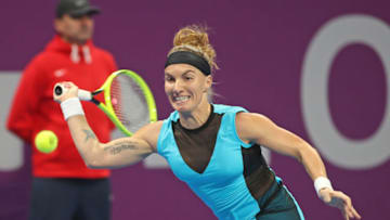 Svetlana Kuznetsova of Russia returns the ball to Aryna Sabalenka of Belarus during the semifinals of the Qatar Total Open tournament in Doha, on February 28, 2020. (Photo by KARIM JAAFAR / AFP) (Photo by KARIM JAAFAR/AFP via Getty Images)