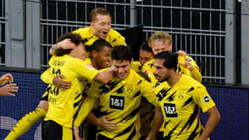 Emre Can of Borussia Dortmund celebrates with his teammates. (Photo by Alex Gottschalk/DeFodi Images via Getty Images)