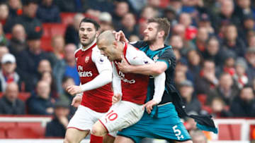 LONDON, ENGLAND - APRIL 08: Jack Stephens of Southampton clashes with Jack Wilshere of Arsenal which later leads to Jack Stephens of Southampton being shown a red card during the Premier League match between Arsenal and Southampton at Emirates Stadium on April 8, 2018 in London, England. (Photo by Julian Finney/Getty Images)