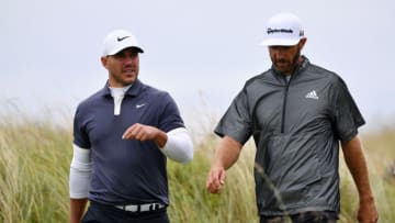 PORTRUSH, NORTHERN IRELAND - JULY 17: Brooks Koepka and Dustin Johnson of the United States look on during a practice round prior to the 148th Open Championship held on the Dunluce Links at Royal Portrush Golf Club on July 17, 2019 in Portrush, United Kingdom. (Photo by Stuart Franklin/Getty Images)