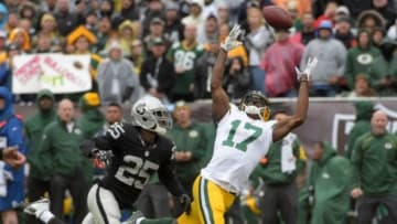 Dec 20, 2015; Oakland, CA, USA; Green Bay Packers wide receiver Davante Adams (17) is defended by Oakland Raiders cornerback D.J. Hayden (25) during an NFL football game at O.co Coliseum. Mandatory Credit: Kirby Lee-USA TODAY Sports