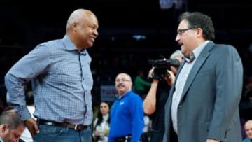 Nov 7, 2014; Auburn Hills, MI, USA; Detroit Lions head coach Jim Caldwell (left) talks with Detroit Pistons head coach Stan Van Gundy (right) before the game against the Milwaukee Bucks at The Palace of Auburn Hills. Mandatory Credit: Tim Fuller-USA TODAY Sports