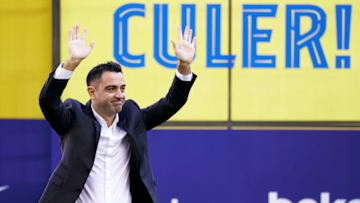 BARCELONA, SPAIN - NOVEMBER 08: New FC Barcelona Head Coach Xavi Hernandez acknowledges fans during a press conference at Camp Nou on November 08, 2021 in Barcelona, Spain. (Photo by Pedro Salado/Quality Sport Images/Getty Images)