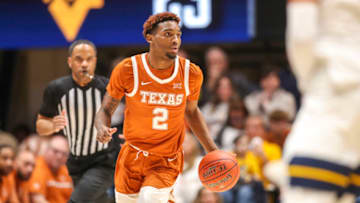 Jan 21, 2023; Morgantown, West Virginia, USA; Texas Longhorns guard Arterio Morris (2) dribbles the ball during the first half against the West Virginia Mountaineers at WVU Coliseum. Mandatory Credit: Ben Queen-USA TODAY Sports