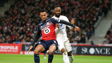 LILLE, FRANCE - MARCH 8: Gabriel dos Santos Magalhaes of Lille, Moussa Dembele of Lyon during the Ligue 1 match between Lille OSC (LOSC) and Olympique Lyonnais (Lyon, OL) at Stade Pierre Mauroy on March 8, 2020 in Villeneuve d'Ascq near Lille, France. (Photo by Jean Catuffe/Getty Images)