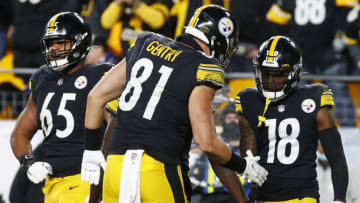 PITTSBURGH, PENNSYLVANIA - DECEMBER 05: Diontae Johnson #18 of the Pittsburgh Steelers celebrates his touchdown with Zach Gentry #81 of the Pittsburgh Steelers during the fourth quarter against the Baltimore Ravens at Heinz Field on December 05, 2021 in Pittsburgh, Pennsylvania. (Photo by Justin K. Aller/Getty Images)