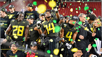 SANTA CLARA, CALIFORNIA - DECEMBER 06: The Oregon Ducks celebrate after the Pac-12 Championship football game against the Utah Utes at Levi's Stadium on December 6, 2019 in Santa Clara, California. The Oregon Ducks won 37-15. (Alika Jenner/Getty Images)