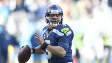 Jan 17, 2016; Charlotte, NC, USA; Seattle Seahawks quarterback Russell Wilson (3) looks to pass during the fourth quarter against the Carolina Panthers in a NFC Divisional round playoff game at Bank of America Stadium. Mandatory Credit: John David Mercer-USA TODAY Sports