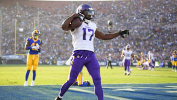 LOS ANGELES, CA - SEPTEMBER 27: Wide receiver Aldrick Robinson #17 of the Minnesota Vikings catches to score a touchdown and take a 7-0 lead against the Los Angeles Rams in the first quarter at Los Angeles Memorial Coliseum on September 27, 2018 in Los Angeles, California. (Photo by Harry How/Getty Images)