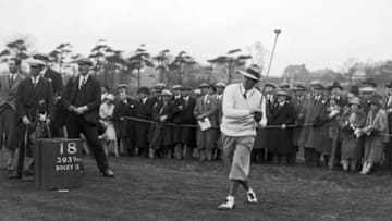 April 1929: American golfer Leo Diegel driving from the 18th tee during the Ryder Cup tournament at Leeds. (Photo by Central Press/Getty Images)