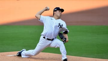 Oct 7, 2020; San Diego, California, USA; New York Yankees starting pitcher Masahiro Tanaka (19) pitches in the first inning against the Tampa Bay Rays during game three of the 2020 ALDS at Petco Park. Mandatory Credit: Gary A. Vasquez-USA TODAY Sports