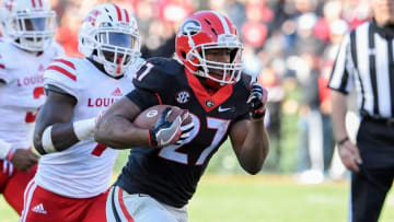 Nov 19, 2016; Athens, GA, USA; Georgia Bulldogs running back Nick Chubb (27) runs for a touchdown after a catch against the Louisiana-Lafayette Ragin Cajuns during the second half at Sanford Stadium. Georgia defeated Louisiana-Lafayette 35-21. Mandatory Credit: Dale Zanine-USA TODAY Sports