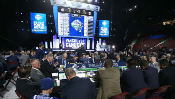 VANCOUVER, BRITISH COLUMBIA - JUNE 22: A general view of the Vancouver Canucks draft table is seen during Rounds 2-7 of the 2019 NHL Draft at Rogers Arena on June 22, 2019 in Vancouver, Canada. (Photo by Jeff Vinnick/NHLI via Getty Images)