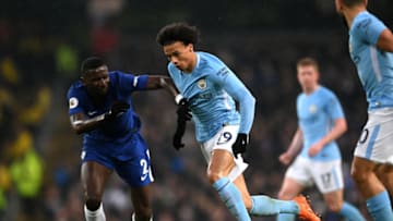 MANCHESTER, ENGLAND - MARCH 04: Antonio Rudiger of Chelsea and Leroy Sane of Manchester City battle for the ball during the Premier League match between Manchester City and Chelsea at Etihad Stadium on March 4, 2018 in Manchester, England. (Photo by Laurence Griffiths/Getty Images)