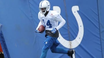Jul 24, 2014; Anderson, IN, USA; Indianapolis Colts wide receiver Hakeem Nicks (14) catches a pass during training camp at Anderson University. Mandatory Credit: Brian Spurlock-USA TODAY Sports