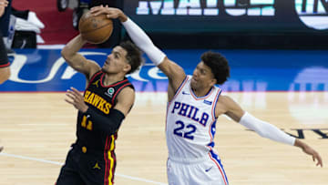 Jun 20, 2021; Philadelphia, Pennsylvania, USA; Philadelphia 76ers guard Matisse Thybulle (22) blocks the shot of Atlanta Hawks guard Trae Young (11) during the fourth quarter of game seven of the second round of the 2021 NBA Playoffs at Wells Fargo Center. Mandatory Credit: Bill Streicher-USA TODAY Sports