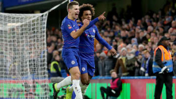 LONDON, ENGLAND - JANUARY 27: Willian of Chelsea celebrates after scoring his team's first goal with Cesar Azpilicueta of Chelsea during the FA Cup Fourth Round match between Chelsea and Sheffield Wednesday at Stamford Bridge on January 27, 2019 in London, United Kingdom. (Photo by Catherine Ivill/Getty Images)
