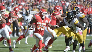 Oct 25, 2015; Kansas City, MO, USA; Kansas City Chiefs running back Charcandrick West (35) runs the ball as Pittsburgh Steelers linebacker Bud Dupree (48) attempts the tackle during the second half at Arrowhead Stadium. The Chiefs won 23-13. Mandatory Credit: Denny Medley-USA TODAY Sports