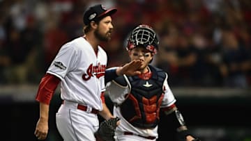 October 6, 2016; Cleveland, OH, USA; Cleveland Indians relief pitcher Andrew Miller (24) and catcher Roberto Perez (55) return to the dugout following the fifth inning against the Boston Red Sox during game one of the 2016 ALDS playoff baseball game at Progressive Field. Mandatory Credit: Ken Blaze-USA TODAY Sports