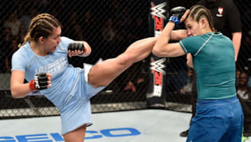 LAS VEGAS, NV - DECEMBER 01: (L-R) Nicco Montano kicks Roxanne Modafferi in their women's flyweight championship bout during the TUF Finale event inside Park Theater on December 01, 2017 in Las Vegas, Nevada. (Photo by Jeff Bottari/Zuffa LLC/Zuffa LLC via Getty Images)