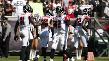 Sep 18, 2016; Oakland, CA, USA; Atlanta Falcons wide receiver Julio Jones (11) is congratulated by quarterback Matt Ryan (2) after scoring a touchdown against the Oakland Raiders in the second quarter at Oakland-Alameda County Coliseum. Mandatory Credit: Cary Edmondson-USA TODAY Sports