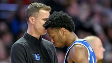 Duke basketball head coach Jon Scheyer and point guard Jeremy Roach (Photo by Grant Halverson/Getty Images)