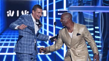 LAS VEGAS, NEVADA - MAY 01: Rob Gronkowski (L) and Terry Crews present an award during the 2019 Billboard Music Awards at MGM Grand Garden Arena on May 1, 2019 in Las Vegas, Nevada. (Photo by Ethan Miller/Getty Images)