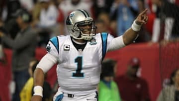 Dec 28, 2014; Atlanta, GA, USA; Carolina Panthers quarterback Cam Newton (1) celebrates after a touchdown pass against the Atlanta Falcons in the first quarter at the Georgia Dome. Mandatory Credit: Brett Davis-USA TODAY Sports