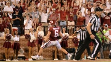 Sep 5, 2015; Norman, OK, USA; Oklahoma Sooners quarterback Baker Mayfield (6) scores a touchdown against the Akron Zips during the third quarter at Gaylord Family - Oklahoma Memorial Stadium. Mandatory Credit: Mark D. Smith-USA TODAY Sports