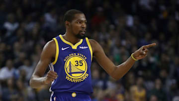OAKLAND, CA - NOVEMBER 13: Kevin Durant #35 of the Golden State Warriors reacts after the Warriors made a basket against the Atlanta Hawks at ORACLE Arena on November 13, 2018 in Oakland, California. NOTE TO USER: User expressly acknowledges and agrees that, by downloading and or using this photograph, User is consenting to the terms and conditions of the Getty Images License Agreement. (Photo by Ezra Shaw/Getty Images)