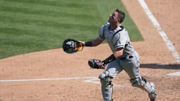 OAKLAND, CALIFORNIA - SEPTEMBER 29: James McCann #33 of the Chicago White Sox tracks a foul pop-up against the Oakland Athletics during the seventh inning of the Wild Card Round Game One at RingCentral Coliseum on September 29, 2020 in Oakland, California. (Photo by Thearon W. Henderson/Getty Images)