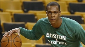 Dec 31, 2013; Boston, MA, USA; Boston Celtics point injured guard Rajon Rondo (9) dribbles before their game against the Atlanta Hawks at TD Garden. Mandatory Credit: Winslow Townson-USA TODAY Sports