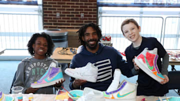 MEMPHIS, TN - MARCH 8: Mike Conley #11 of the Memphis Grizzlies design sneakers with patients of St. Jude Children's Research Hospital as a part of "Hoops for St. Jude" on March 8, 2018 at FedExForum in Memphis, Tennessee. NOTE TO USER: User expressly acknowledges and agrees that, by downloading and or using this photograph, User is consenting to the terms and conditions of the Getty Images License Agreement. Mandatory Copyright Notice: Copyright 2018 NBAE (Photo by Joe Murphy/NBAE via Getty Images)