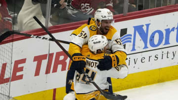 Nashville Predators left wing Tanner Jeannot (84) celebrates his overtime goal against the Chicago Blackhawks at United Center. Mandatory Credit: David Banks-USA TODAY Sports