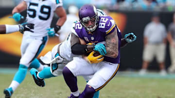 Sep 25, 2016; Charlotte, NC, USA; Carolina Panthers outside linebacker Thomas Davis (58) dives for the tackle on Minnesota Vikings tight end Kyle Rudolph (82) during the second half at Bank of America Stadium. Mandatory Credit: Jim Dedmon-USA TODAY Sports